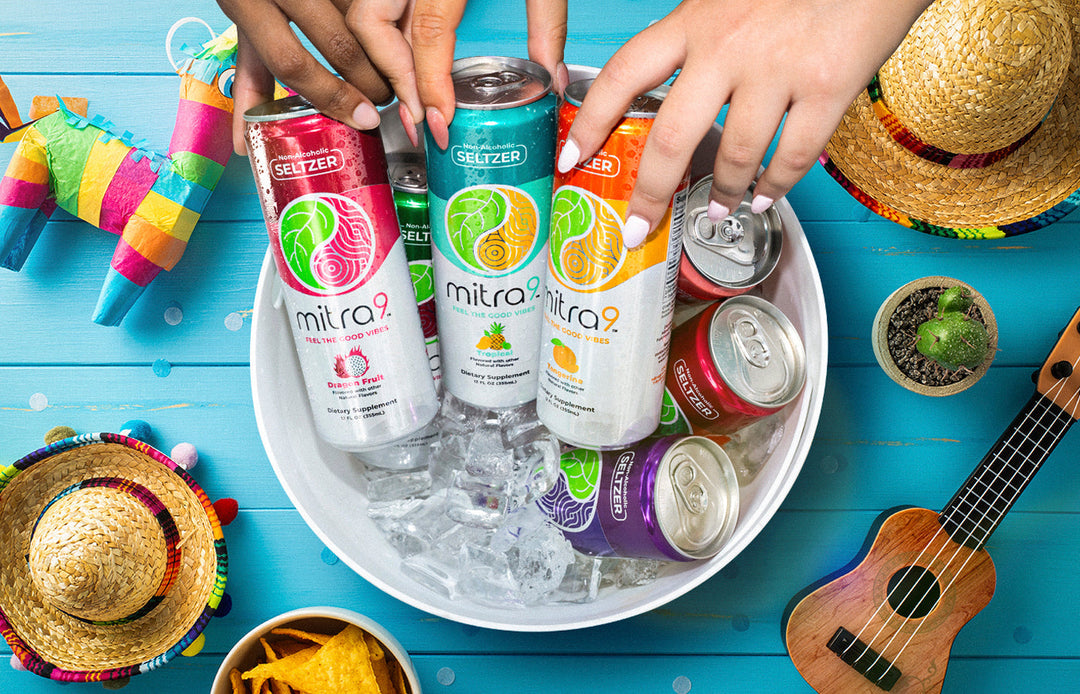 Hands Grabbing Kratom Seltzers from Ice Bucket