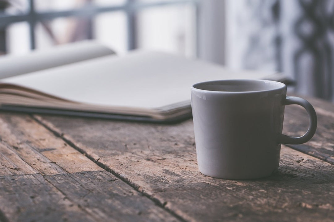Drinking kava in coffee cup while studying
