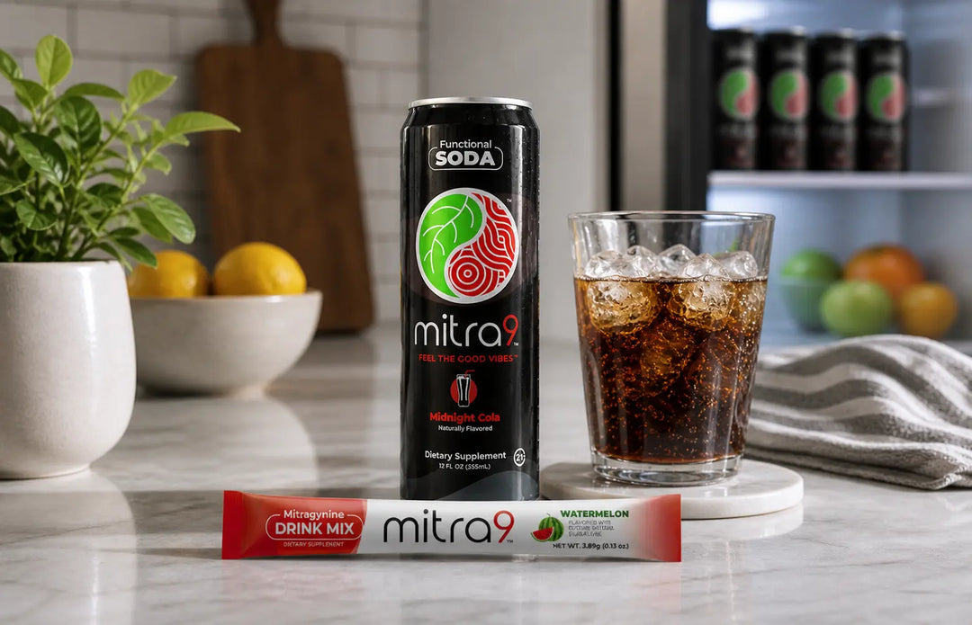 Mitra9 Midnight Cola functional soda can with watermelon mitragynine drink mix stick lying on kitchen counter, glass of iced soda, modern kitchen lifestyle scene showcasing beverage freshness and storage