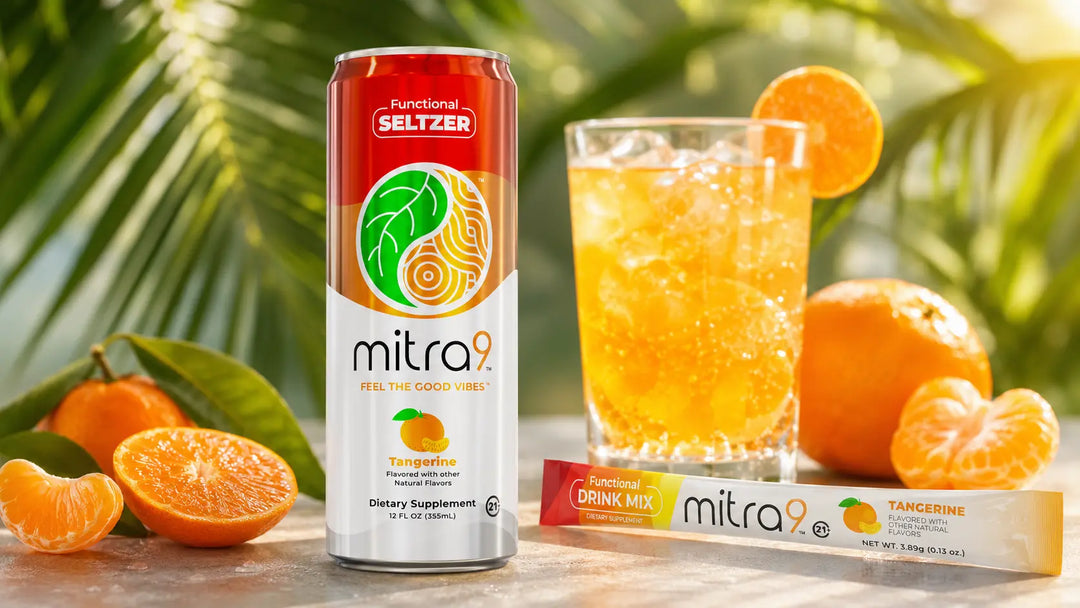 Mitra9 Tangerine functional seltzer and Tangerine drink mix with fresh tangerines and a chilled citrus drink in a bright tropical setting.
