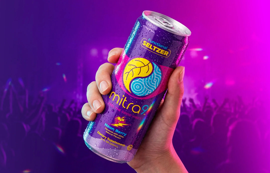 Mitra9 Neon Berry Mitragynine functional seltzer held at concert, non-alcoholic alternative drink with refreshing berry flavor, botanical soda for social occasions