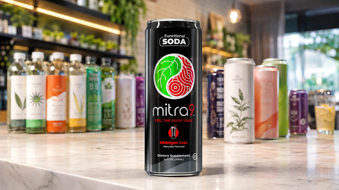 Mitra9 Midnight Cola functional soda displayed with a variety of functional beverages in a modern wellness drink bar setting.