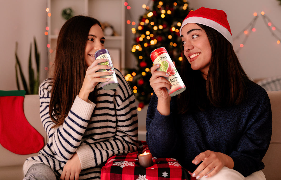 Two Women Sitting Drinking Kratom Seltzer Drinks at a Party