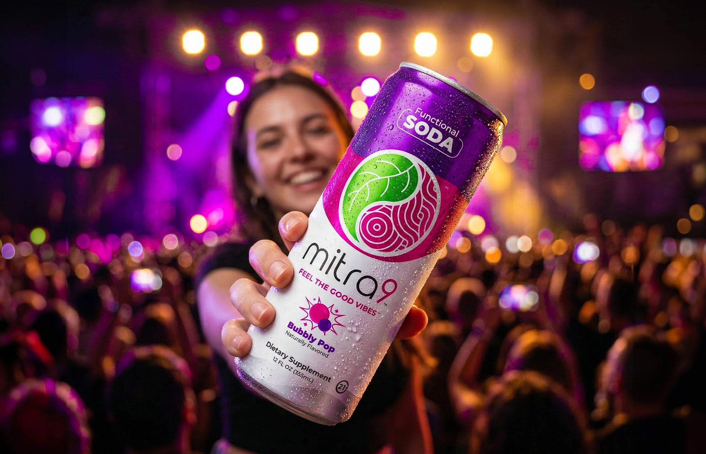 Woman at Concert Holding Functional Mitragynine Soda 